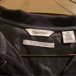 Medium Ck collar shirt. Worn once. Black with dark grey.